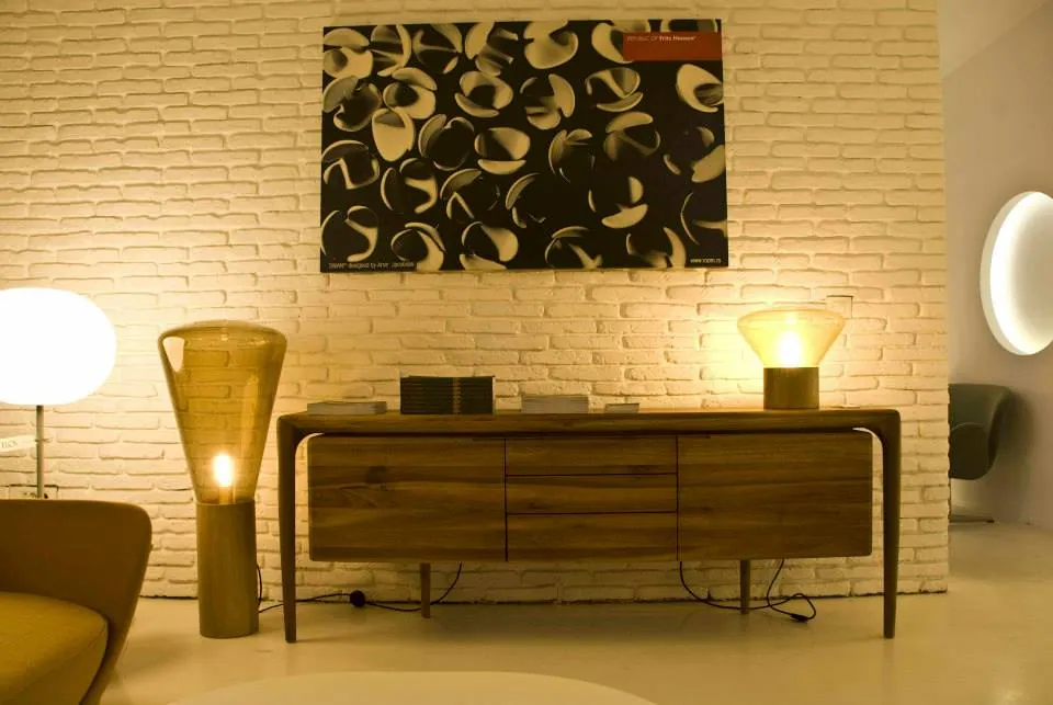 Lightology Lab showroom in Belgrade, lighting displayed above a sideboard